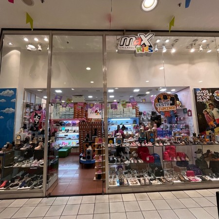 Logo da loja max kids calcados