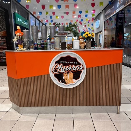Logo da loja companhia do churros