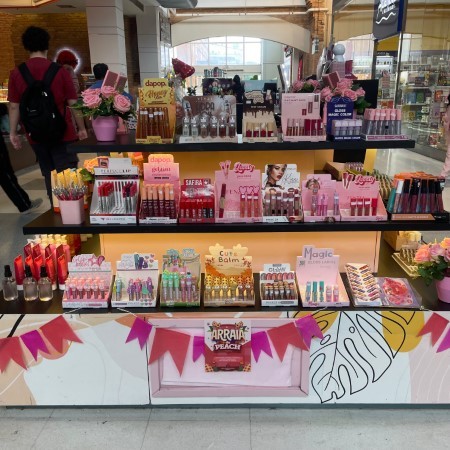 Logo da loja peach makeup