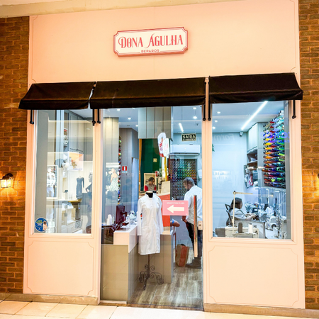 Logo da loja dona agulha