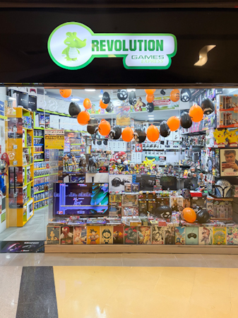 Logo da loja revolution games
